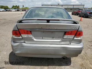 1999 Infiniti G20 z VIN JNKCP11A8XT015021, wystawiony jako Copart lot #67966844 z przebiegiem 268 922 mil mil oraz Szkody całkowita. Historia ofert i sprzedaży dostępna na DreamBid. Obrazek 6.