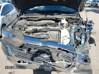 2019 Ram 1500 Big Horn z VIN 1C6RREFT4KN769061, wystawiony jako IAAI lot #41356744 z przebiegiem Nie podano mil oraz . Historia ofert i sprzedaży dostępna na DreamBid. Obrazek 10.