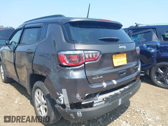 2018 Jeep Compass Sport with VIN 3C4NJDAB7JT235218, listed as a IAAI auction lot 42473771 with 106,302 mi miles and . Bid and sale history available at DreamBid. Image 6.