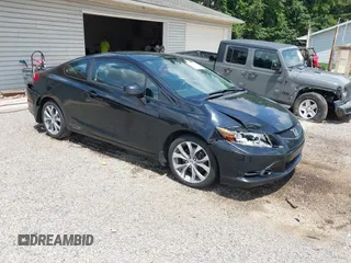 2012 Honda Civic Si with VIN 2HGFG4A52CH700904, listed as a IAAI auction lot 42590276 with 231,224 mi miles and . Bid and sale history available at DreamBid. Image 1.
