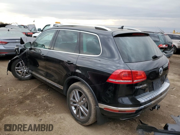 2016 Volkswagen Touareg Sport with VIN WVGEF9BP4GD011455, listed as a Copart auction lot 49734885 with 145,450 mi miles and Salvage Title. Bid and sale history available at DreamBid. Image 2.
