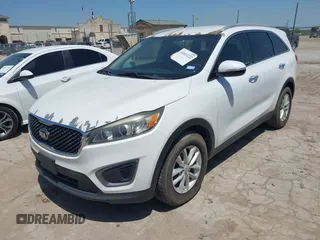 2016 Kia Sorento LX with VIN 5XYPG4A3XGG028712, listed as a IAAI auction lot 42013222 with 112,736 mi miles. Bid and sale history available at carsss.com. Image 2.