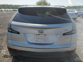 2019 Cadillac XT4 FWD Sport z VIN 1GYFZER43KF207317, wystawiony jako Copart lot #52514215 z przebiegiem 69 084 mil mil oraz Szkoda całkowita • Salvage title. Historia ofert i sprzedaży dostępna na DreamBid. Obrazek 6.