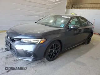 2024 Honda Civic Sport Touring z VIN 19XFL1H81RE013572, wystawiony jako Copart lot #55269995 z przebiegiem 9 375 mil mil oraz Szkoda całkowita • Salvage title. Historia ofert i sprzedaży dostępna na DreamBid. Obrazek 1.