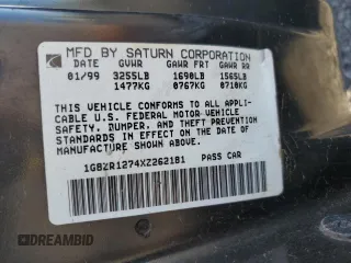 1999 Saturn SC with VIN 1G8ZR1274XZ262181, listed as a Copart auction lot 75931774 with Not Provided miles and Salvage Title. Bid and sale history available at carsss.com. Image 12.