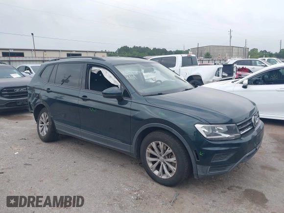 2019 Volkswagen Tiguan S with VIN 3VV1B7AXXKM002312, listed as a IAAI auction lot 42282809 with 80,781 mi miles and . Bid and sale history available at DreamBid. Image 1.