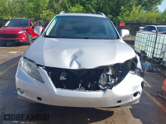 2012 Lexus RX 350 z VIN 2T2BK1BA5CC129663, wystawiony jako IAAI lot #42198701 z przebiegiem 156 525 mil mil oraz . Historia ofert i sprzedaży dostępna na DreamBid. Obrazek 13.
