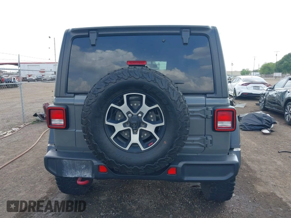 2020 Jeep Wrangler Unlimited Rubicon z VIN 1C4HJXFG7LW193665, wystawiony jako IAAI lot #41874930 z przebiegiem 58 884 mil mil oraz . Historia ofert i sprzedaży dostępna na DreamBid. Obrazek 16.