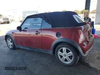 2007 MINI Convertible with VIN WMWRF33537TG17447, listed as a Copart auction lot 59015995 with 137,032 mi miles and Salvage title. Bid and sale history available at DreamBid. Image 2.