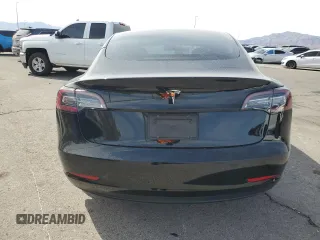 2021 Tesla Model 3 Standard Range Plus with VIN 5YJ3E1EA0MF997191, listed as a Copart auction lot 49659825 with 40,647 mi miles and Salvage Title. Bid and sale history available at DreamBid. Image 6.