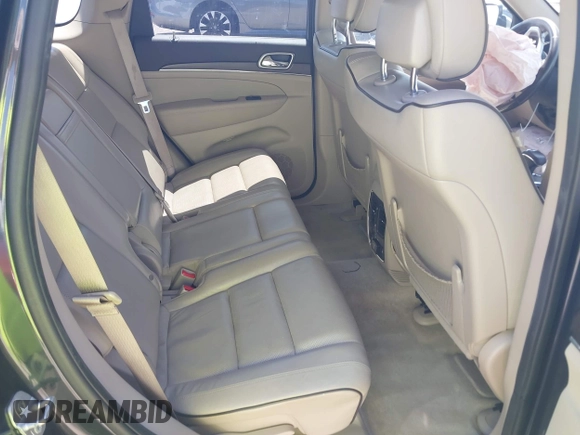 2015 Jeep Grand Cherokee High Altitude with VIN 1C4RJFCG5FC807394, listed as a IAAI auction lot 42452034 with 72,011 mi miles and . Bid and sale history available at DreamBid. Image 8.