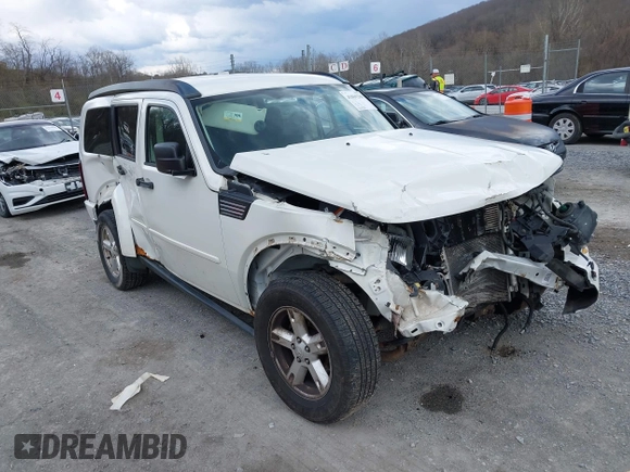 2007 Dodge Nitro SXT with VIN 1D8GU28K77W727391, listed as a IAAI auction lot 41869288 with 214,920 mi miles. Bid and sale history available at carsss.com. Image 1.