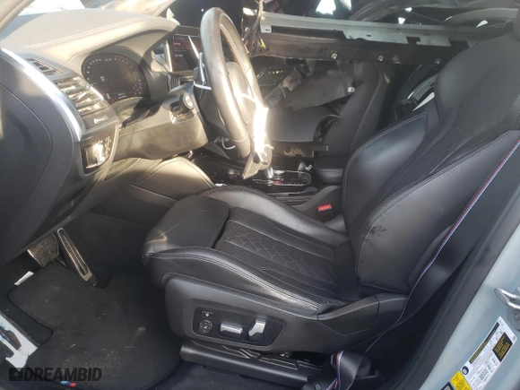 2022 BMW X4 M with VIN 5YM23EC05N9L05268, listed as a Copart auction lot 81892214 with 37163 miles and Salvage Title. Bid and sale history available at carsss.com. Image 7.