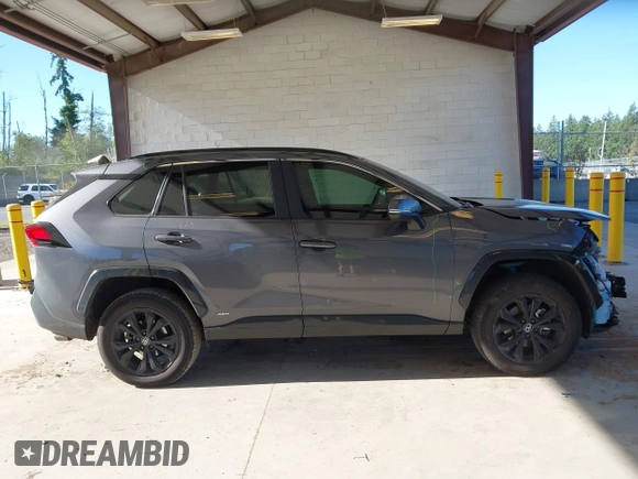2022 Toyota RAV4 Hybrid SE with VIN 2T3T6RFVXNW033965, listed as a IAAI auction lot 42368450 with 27,377 mi miles and . Bid and sale history available at DreamBid. Image 14.