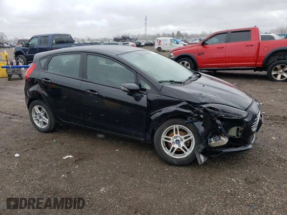 2017 Ford Fiesta SE with VIN 3FADP4EJXHM129934, listed as a Copart auction lot 52249255 with 85,203 mi miles and Salvage Title. Bid and sale history available at carsss.com. Image 4.