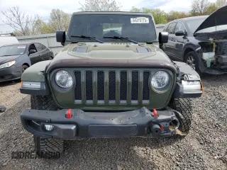 2021 Jeep Wrangler Unlimited Rubicon with VIN 1C4JJXFM3MW555919, listed as a Copart auction lot 54319775 with 51,188 mi miles and Salvage title. Bid and sale history available at DreamBid. Image 5.