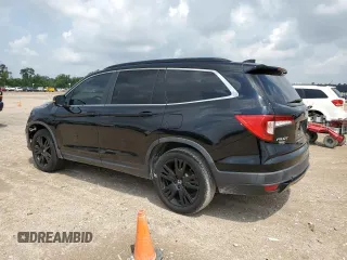 2021 Honda Pilot Special Edition with VIN 5FNYF5H29MB022140, listed as a Copart auction lot 54865815 with 87,294 mi miles and Salvage Title. Bid and sale history available at DreamBid. Image 2.