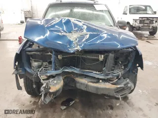 2005 Chevrolet TrailBlazer LT with VIN 1GNDT13S052136871, listed as a IAAI auction lot 41644035 with 174,070 mi miles. Bid and sale history available at carsss.com. Image 6.