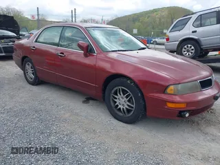 2000 Mitsubishi Diamante LS z VIN 6MMAP67P4YT003358, wystawiony jako IAAI lot #42112046 z przebiegiem 266 341 mil mil oraz . Historia ofert i sprzedaży dostępna na DreamBid. Obrazek 1.