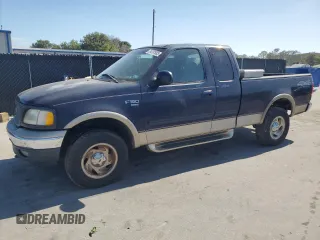 2000 Ford F-150 XL z VIN 1FTRX18L0YNB65908, wystawiony jako Copart lot #54797585 z przebiegiem 298 924 mil mil oraz Czysty tytuł • Clean title. Historia ofert i sprzedaży dostępna na DreamBid. Obrazek 1.