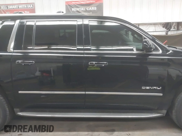 2016 GMC Yukon XL Denali with VIN 1GKS2HKJ8GR102213, listed as a IAAI auction lot 41818737 with 154,607 mi miles and . Bid and sale history available at DreamBid. Image 13.