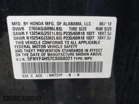 2012 Honda Pilot EX-L with VIN 5FNYF4H57CB068021, listed as a IAAI auction lot 41909996 with 253,542 mi miles and . Bid and sale history available at carsss.com. Image 9.