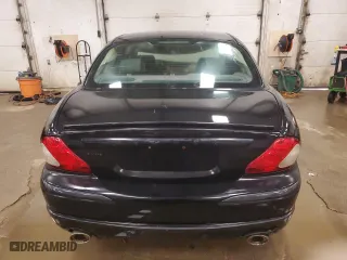 2005 Jaguar X-Type 3.0L with VIN SAJWA51C05WE41522, listed as a Copart auction lot 62837564 with 91,885 mi miles and Clean Title. Bid and sale history available at carsss.com. Image 6.