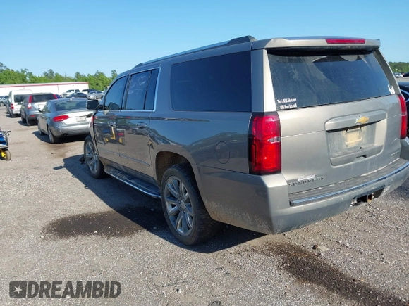 2019 Chevrolet Suburban LT with VIN 1GNSCJKC3KR129739, listed as a IAAI auction lot 42044708 with 105,771 mi miles and . Bid and sale history available at DreamBid. Image 3.