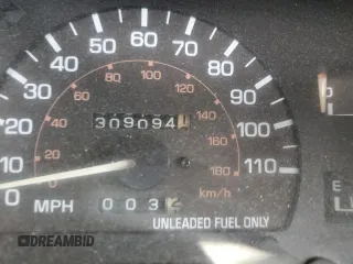 1991 Toyota Pickup DLX z VIN JT4VN13GXM5041525, wystawiony jako Copart lot #80709474 z przebiegiem 309 094 mil mil oraz Szkoda całkowita • Salvage title. Historia ofert i sprzedaży dostępna na DreamBid. Obrazek 9.