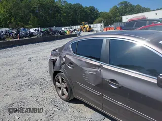 2014 Acura ILX Technology with VIN 19VDE1F73EE013345, listed as a IAAI auction lot 40193022 with 102,265 mi miles and . Bid and sale history available at DreamBid. Image 6.