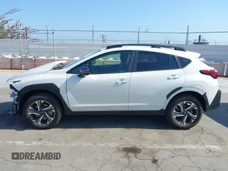 2024 Subaru Crosstrek Premium z VIN JF2GUADC2R8336410, wystawiony jako IAAI lot #42385768 z przebiegiem 22 126 mil mil oraz . Historia ofert i sprzedaży dostępna na DreamBid. Obrazek 15.