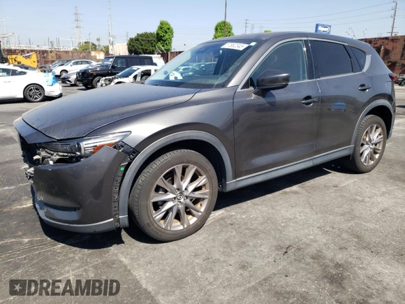 2019 Mazda CX-5 Grand Touring with VIN JM3KFADM6K1641992, listed as a Copart auction lot 57862345 with 37,100 mi miles and Salvage title. Bid and sale history available at DreamBid. Image 1.