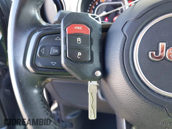 2019 Jeep Wrangler Unlimited Sport S with VIN 1C4HJXDN6KW686480, listed as a IAAI auction lot 41300842 with 67,359 mi miles and . Bid and sale history available at DreamBid. Image 11.