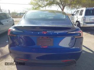 2024 Tesla Model 3 Long Range with VIN 5YJ3E1EB2RF758998, listed as a IAAI auction lot 41861108 with 14,531 mi miles and . Bid and sale history available at DreamBid. Image 17.