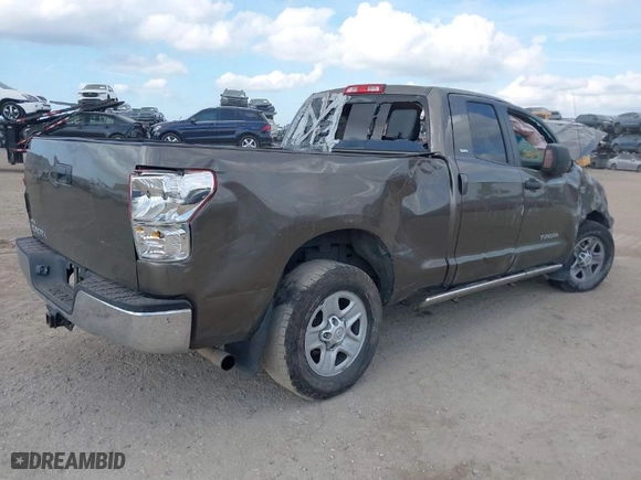 2011 Toyota Tundra 2WD Truck with VIN 5TFRY5F14BX102571, listed as a IAAI auction lot 41592117 with 219,243 mi miles. Bid and sale history available at carsss.com. Image 4.