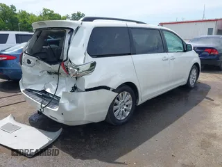 2011 Toyota Sienna XLE AAS with VIN 5TDYK3DC0BS008439, listed as a IAAI auction lot 42292552 with 115,162 mi miles and . Bid and sale history available at DreamBid. Image 4.