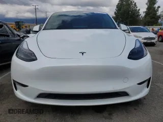 2022 Tesla Model Y Long Range with VIN 7SAYGDEE3NF558379, listed as a Copart auction lot 48594035 with 12,501 mi miles and Salvage Title. Bid and sale history available at carsss.com. Image 5.