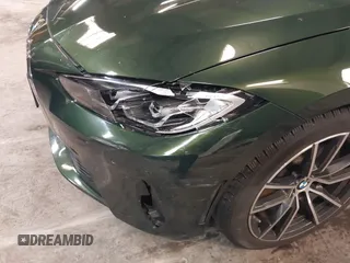 2022 BMW 4 Series 430i xDrive with VIN WBA73AP04NCK88044, listed as a IAAI auction lot 41577730 with 28,907 mi miles and . Bid and sale history available at DreamBid. Image 18.