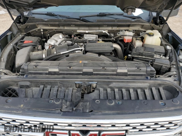 2022 GMC Sierra 2500HD Denali z VIN 1GT49REY4NF295392, wystawiony jako Copart lot #53458505 z przebiegiem 67 522 mil mil oraz Czysty tytuł • Clean title. Historia ofert i sprzedaży dostępna na DreamBid. Obrazek 11.