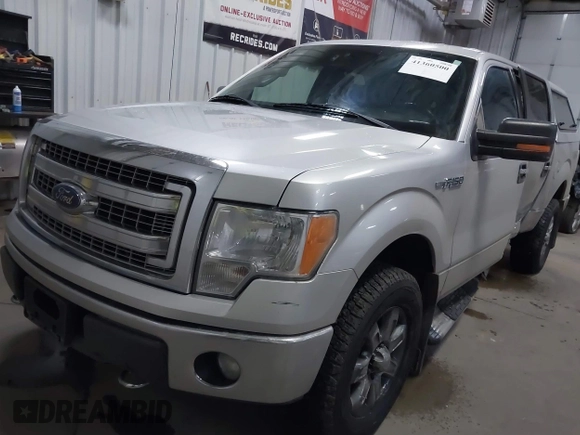 2014 Ford F-150 XL with VIN 1FTFW1EFXEFB69619, listed as a IAAI auction lot 41360500 with 196,708 mi miles and . Bid and sale history available at carsss.com. Image 2.