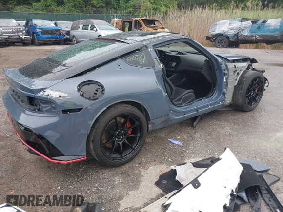 2024 Nissan Z Nismo with VIN JN1BZ4CH9RM360447, listed as a IAAI auction lot 42457597 with 9,723 mi miles and . Bid and sale history available at DreamBid. Image 4.