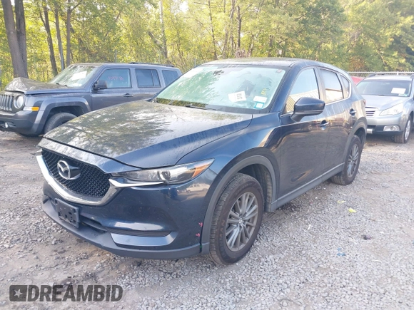 2017 Mazda CX-5 Touring with VIN JM3KFBCL6H0170455, listed as a IAAI auction lot 40381242 with 71,520 mi miles. Bid and sale history available at carsss.com. Image 2.
