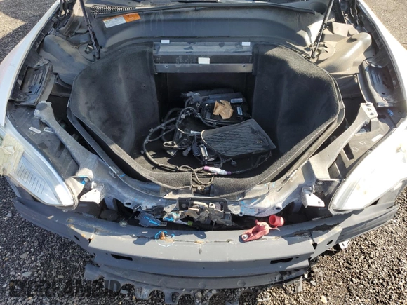 2013 Tesla Model S с VIN 5YJSA1CG2DFP25370, выставлен на аукционе Copart как лот 64003825 с пробегом 85 656 миль миль и Списание • Salvage title. История ставок и продаж доступна на DreamBid. Изображение 11.