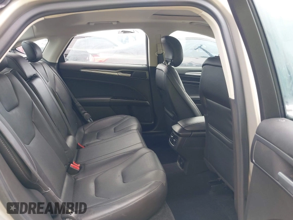 2015 Ford Fusion Energi Titanium with VIN 3FA6P0SU3FR114739, listed as a IAAI auction lot 42003011 with 120,553 mi miles. Bid and sale history available at carsss.com. Image 8.