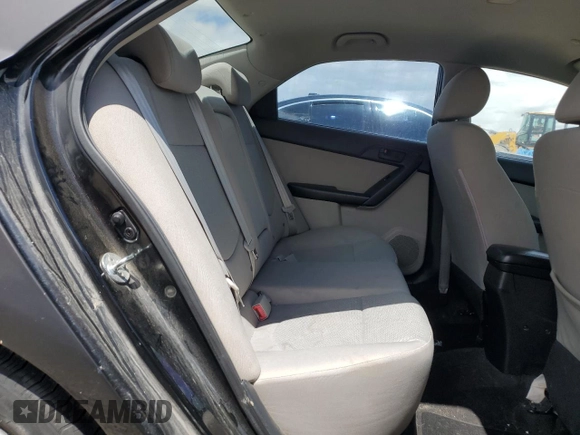 2010 Kia Forte EX z VIN KNAFU4A21A5296203, wystawiony jako Copart lot #57254345 z przebiegiem Nie podano mil oraz Tytuł czysty. Historia ofert i sprzedaży dostępna na DreamBid. Obrazek 10.