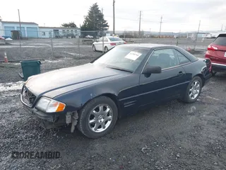 1996 Mercedes-Benz SL-Class with VIN WDBFA67F8TF129267, listed as a IAAI auction lot 41200768 with 104,836 mi miles. Bid and sale history available at carsss.com. Image 2.