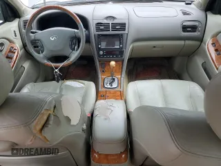 2004 Infiniti I35 z VIN JNKDA31A44T211051, wystawiony jako Copart lot #78260734 z przebiegiem 161 302 mil mil oraz Czysty tytuł • Clean title. Historia ofert i sprzedaży dostępna na DreamBid. Obrazek 8.