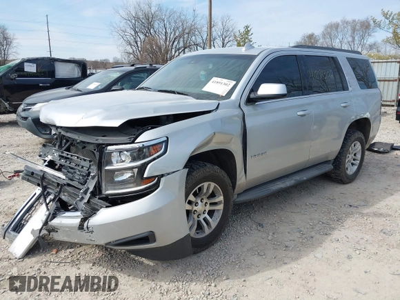 2015 Chevrolet Tahoe LT with VIN 1GNSCBKC4FR552034, listed as a IAAI auction lot 41891302 with 145,969 mi miles and . Bid and sale history available at DreamBid. Image 2.