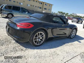 2014 Porsche Boxster z VIN WP0CA2A8XES121365, wystawiony jako Copart lot #49906585 z przebiegiem Nie podano mil oraz Szkoda całkowita • Salvage title. Historia ofert i sprzedaży dostępna na DreamBid. Obrazek 3.