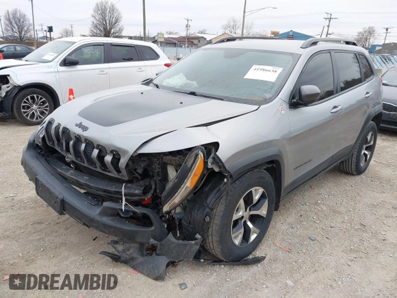 2016 Jeep Cherokee Trailhawk with VIN 1C4PJMBS7GW192574, listed as a IAAI auction lot 41986638 with 144,970 mi miles and . Bid and sale history available at DreamBid. Image 22.